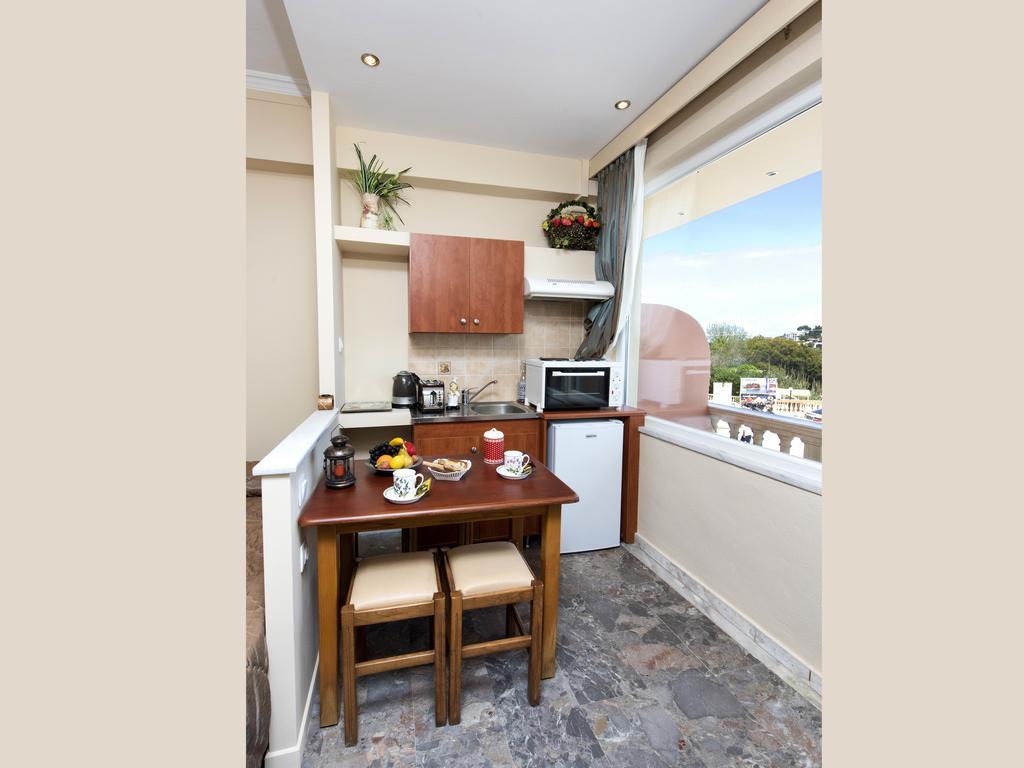 Aparthotel Mouse Island Perama  Habitación foto